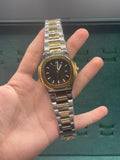 PTK Two Tone Luxury Sports Watch With Black Textured Dial With A Golden Bezel