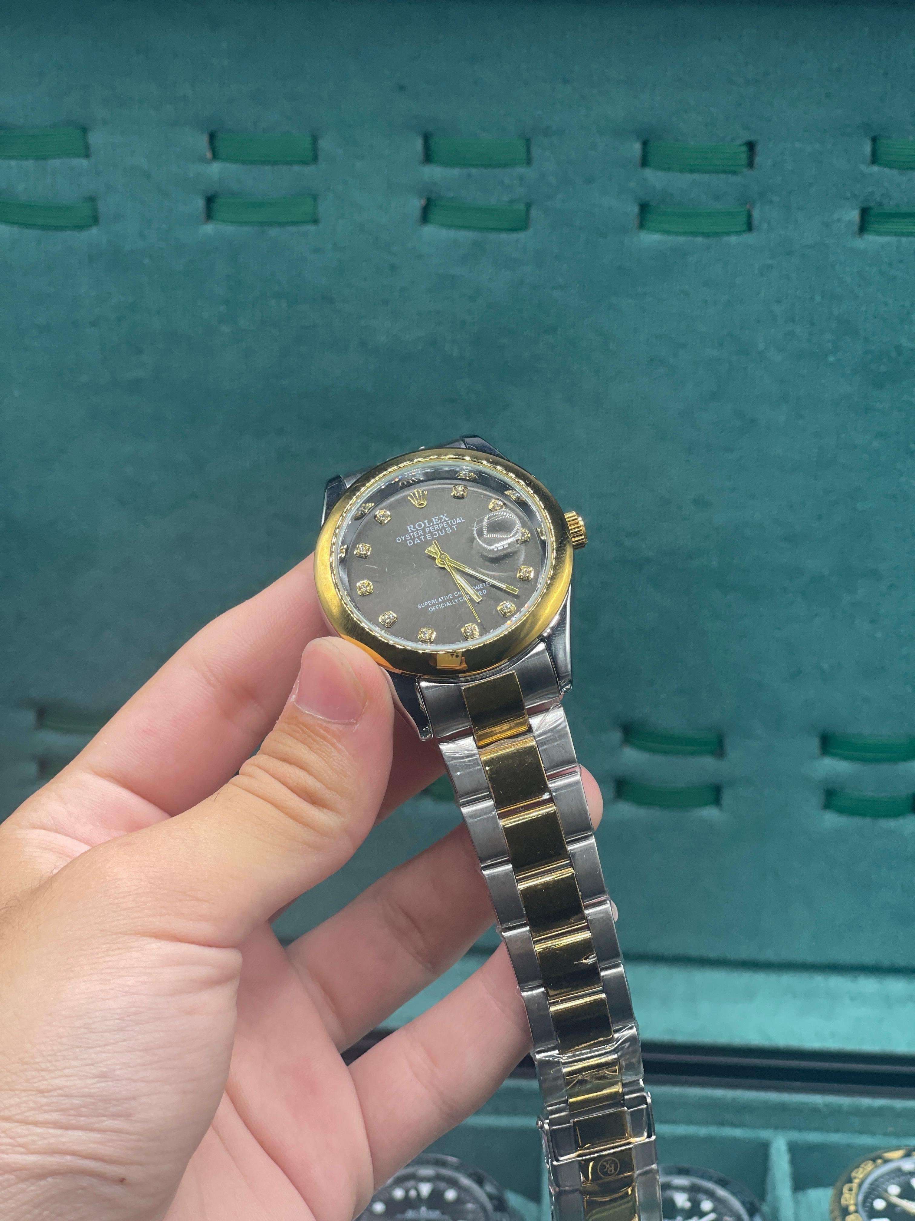 RLX Silver Oyster Chain With Black Round Dial Watch.