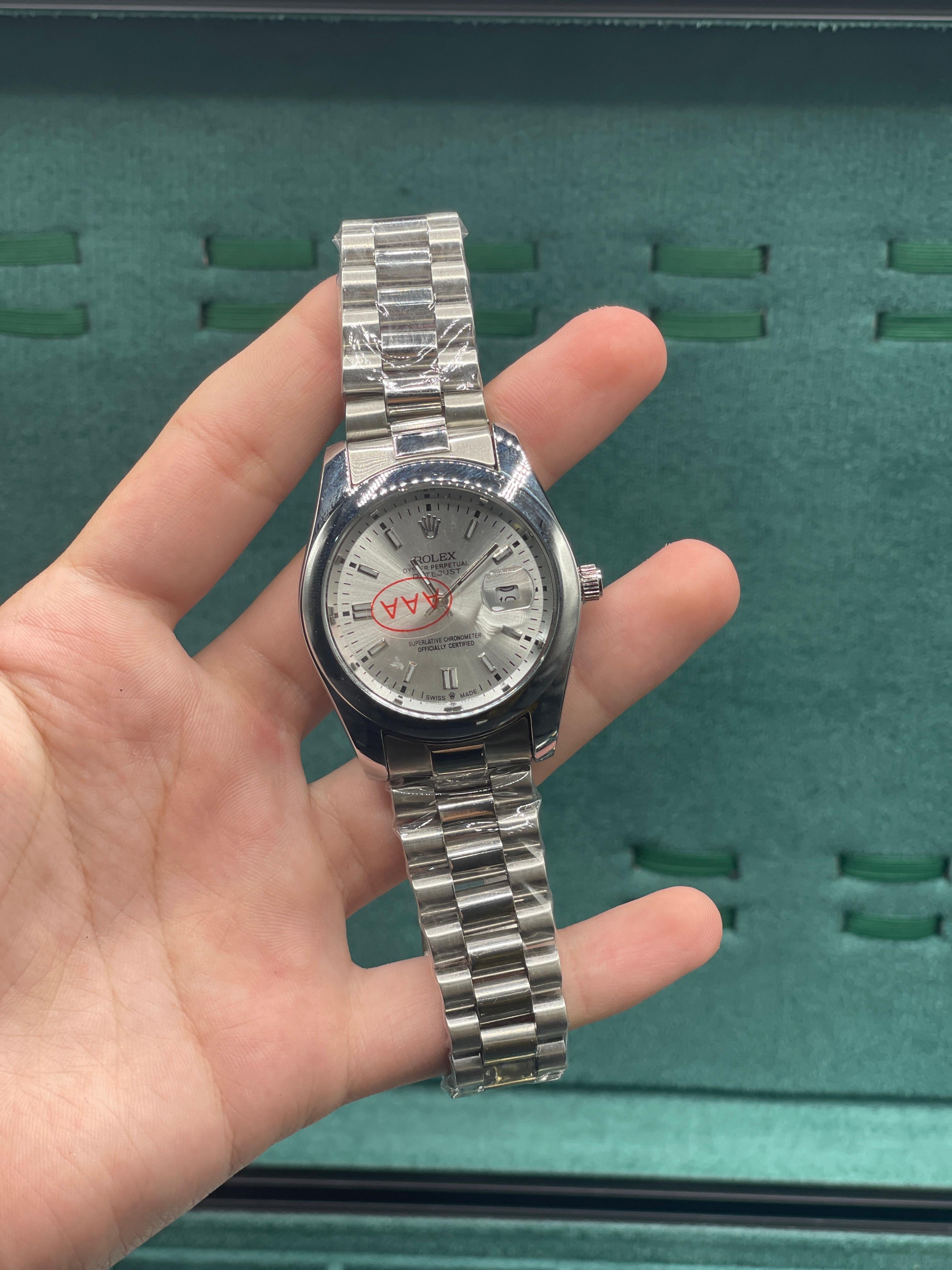 RLX Silver Presidential Chain With White Dial Watch.