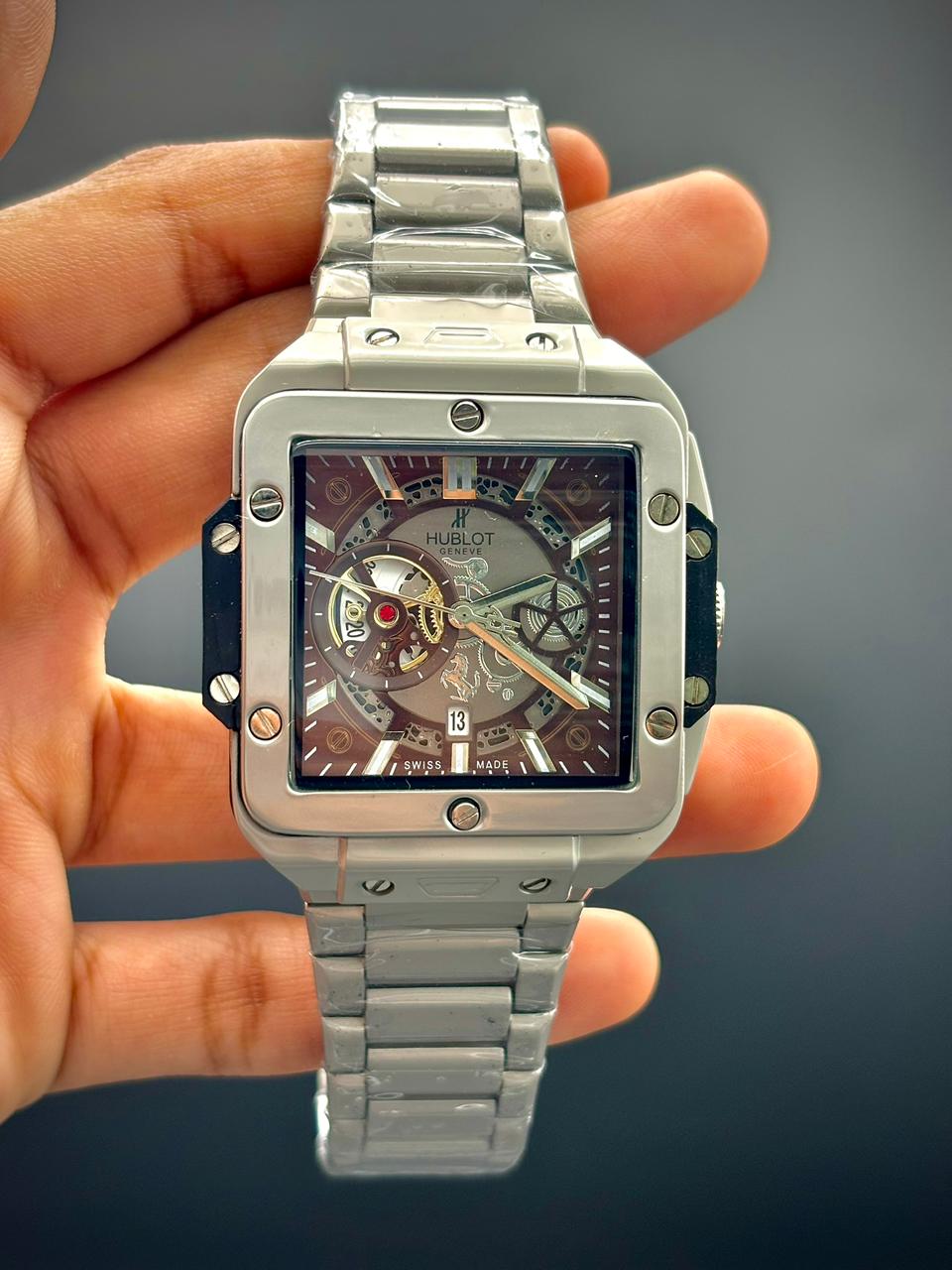 Hb  Sliver Chain With Red Dial Watch.