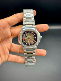 PTK Skeleton Dial Silver Case Watch.