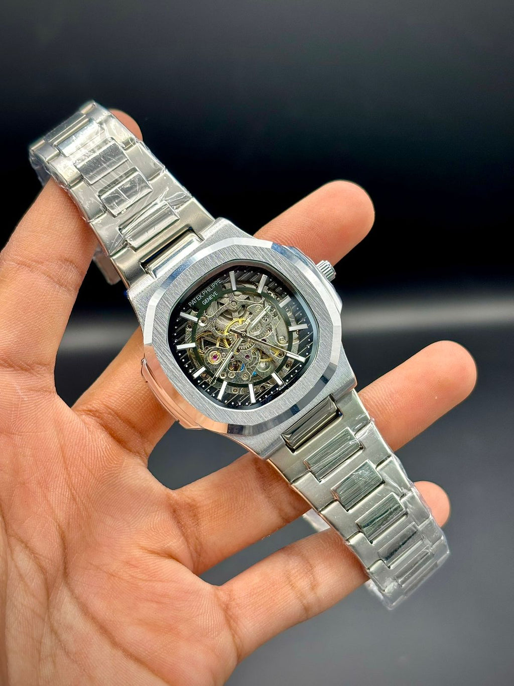 PTK Silver Steel Dark Open Heart Dial Watch.