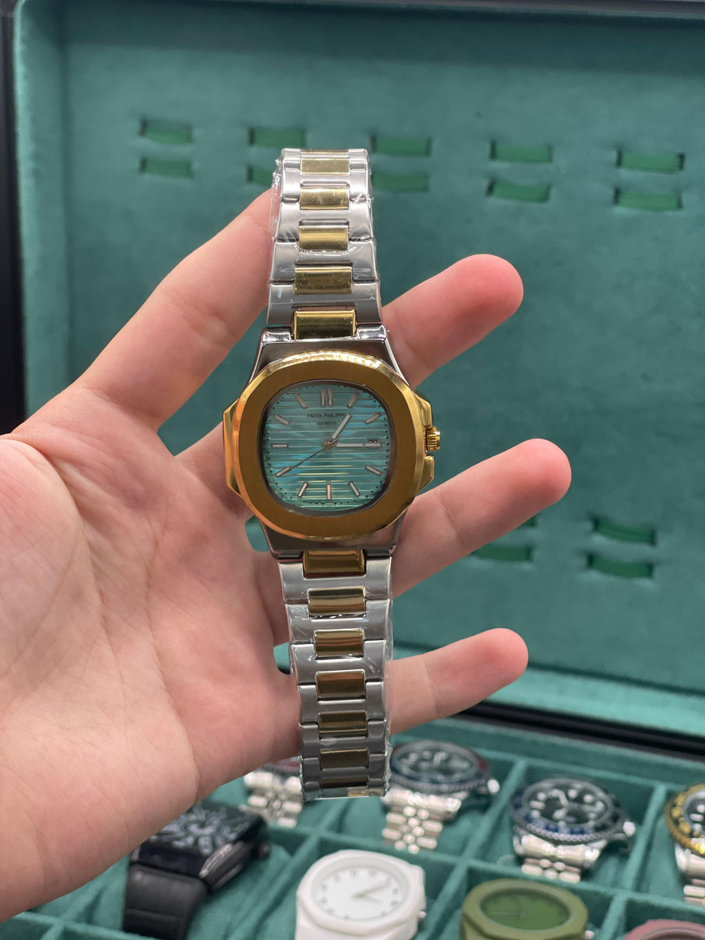 PTK Two-Tone Luxury Sports Watch with Green Textured Dial, Gold Bezel, and Integrated Bracelet