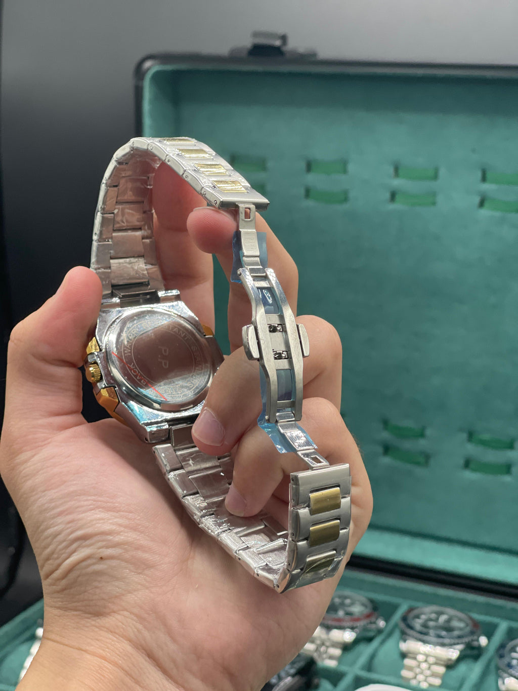 PTK Two-Tone Luxury Sports Watch with Green Textured Dial, Gold Bezel, and Integrated Bracelet