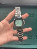 PTK Stainless Steel Luxury Sports Watch with Mint Green Textured Dial, Integrated Bracelet, and Octagonal Case