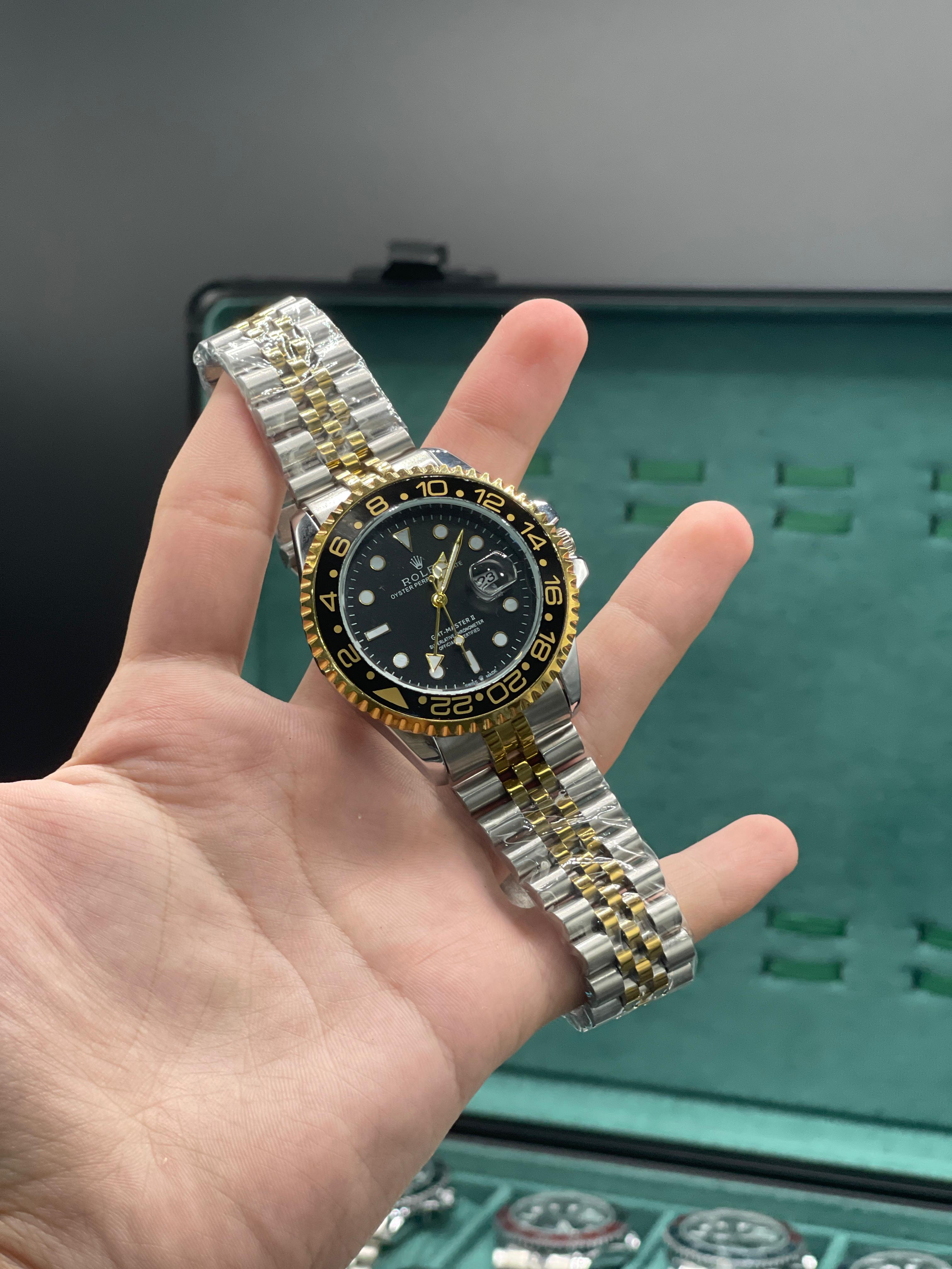 RLX Two-Tone GMT Style Watch with Black Dial, Gold Bezel, and Jubilee Bracelet