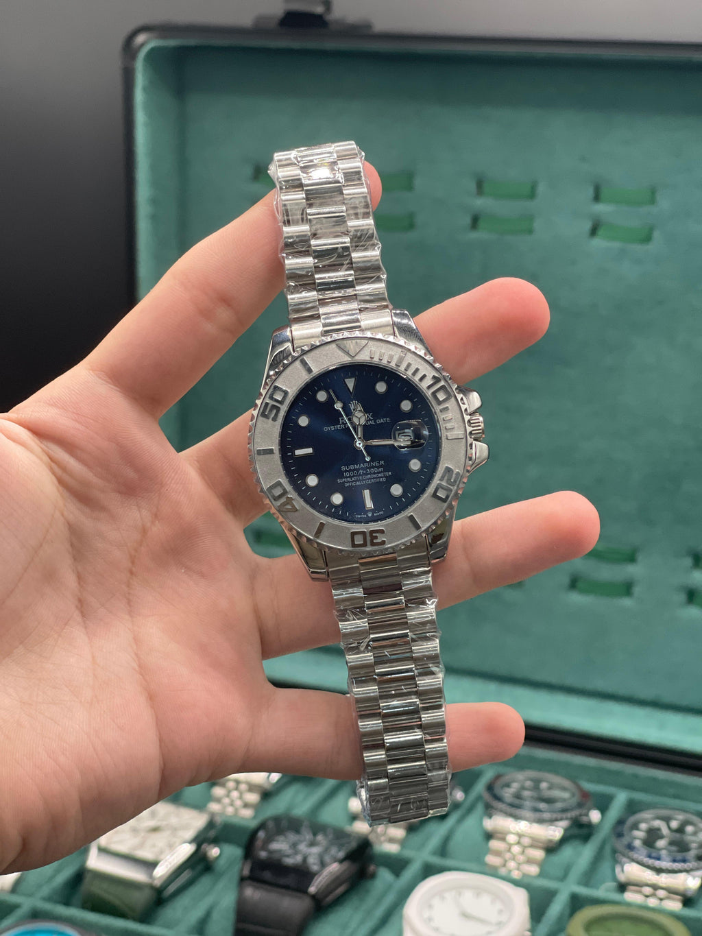 RLX Stainless Steel Dive Style Watch with Blue Dial, Rotating Bezel, and Oyster Bracelet