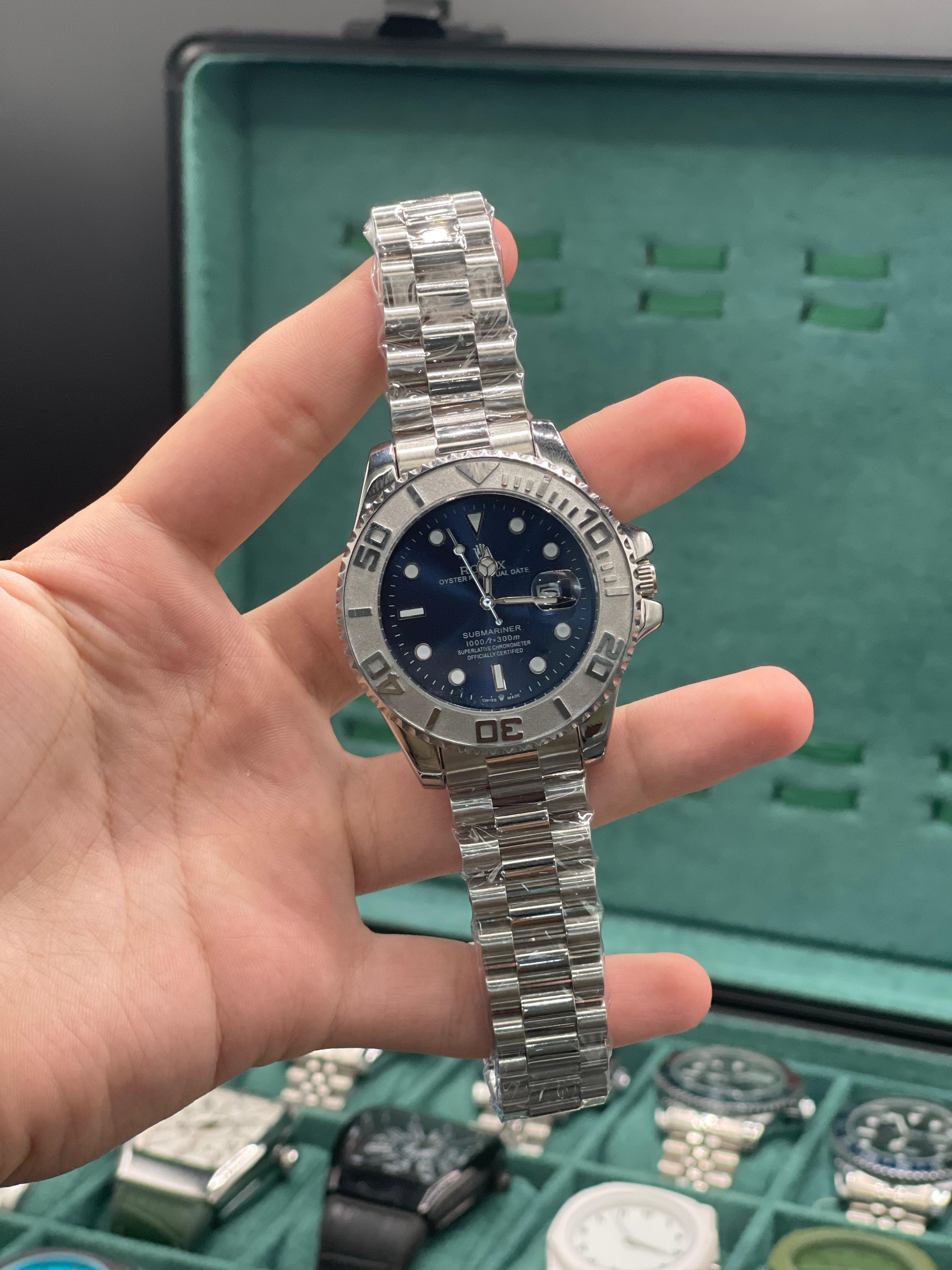 RLX Stainless Steel Dive Style Watch with Blue Dial, Rotating Bezel, and Oyster Bracelet