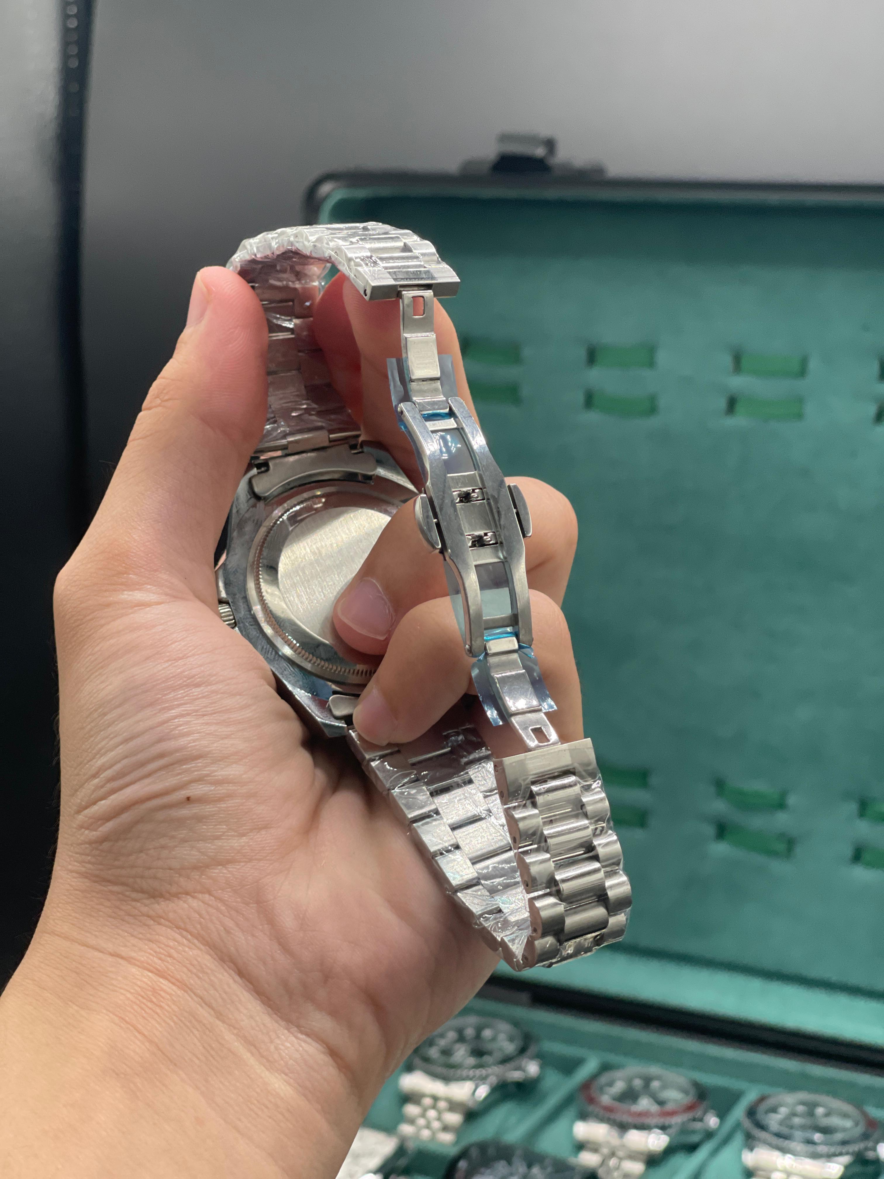 RLX Stainless Steel Dive Style Watch with Blue Dial, Rotating Bezel, and Oyster Bracelet