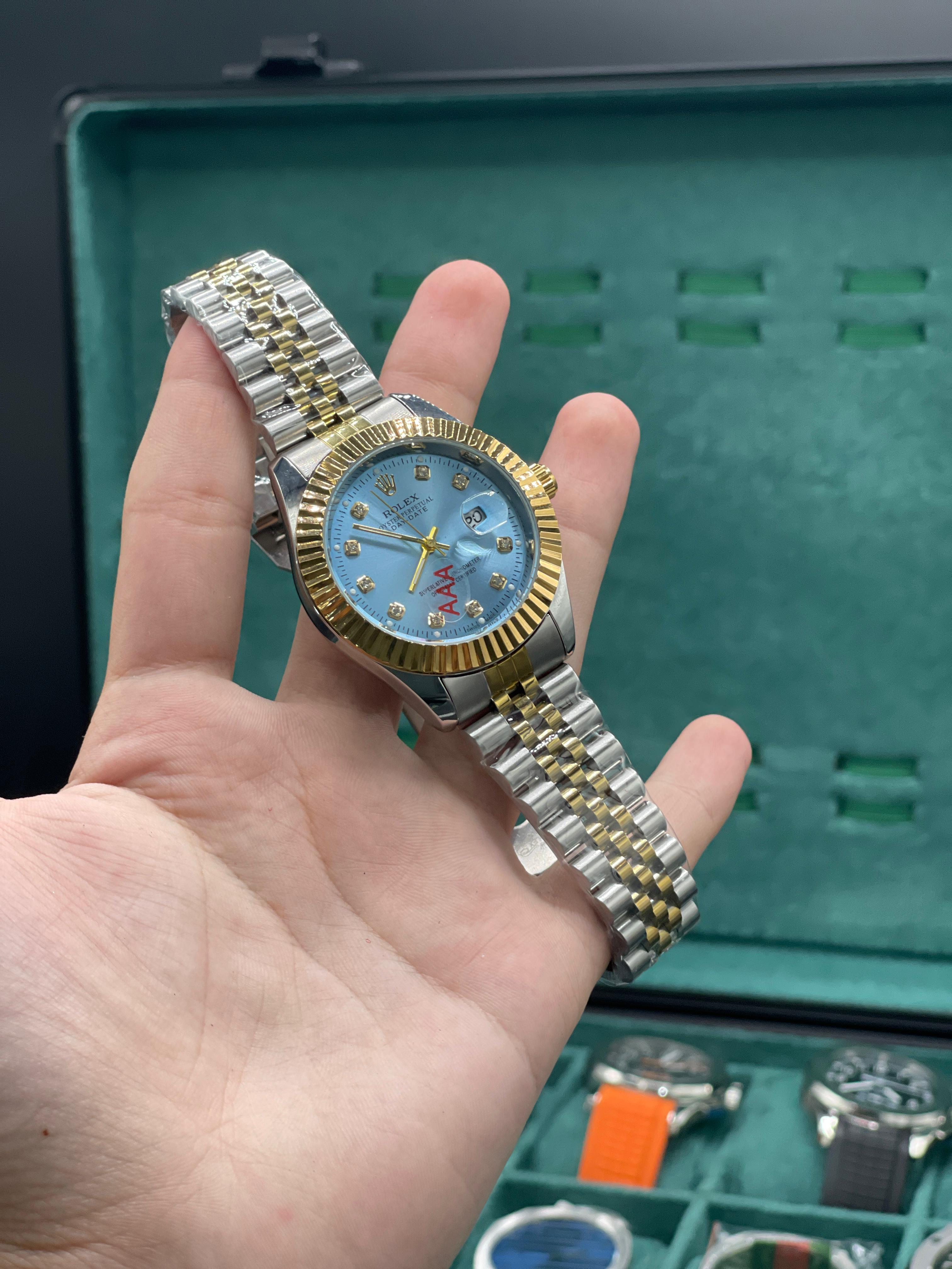 RLX Two-Tone Dress Watch with Ice Blue Diamond Dial, Fluted Gold Bezel, and Jubilee Bracelet