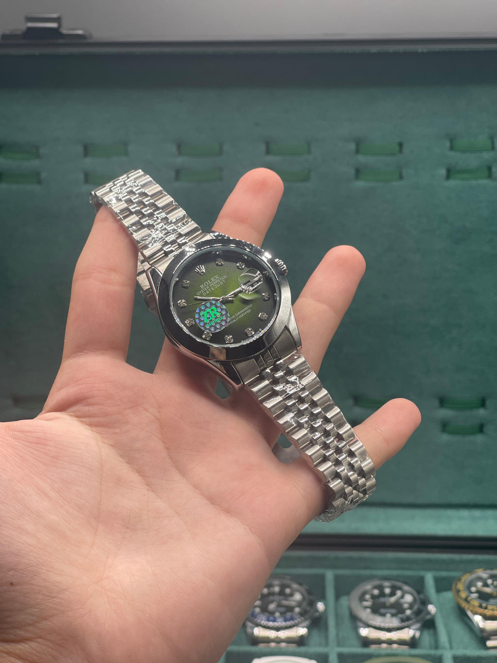 RLX Stainless Steel Dress Watch with Olive Green Diamond Dial, Smooth Bezel, and Jubilee Bracelet