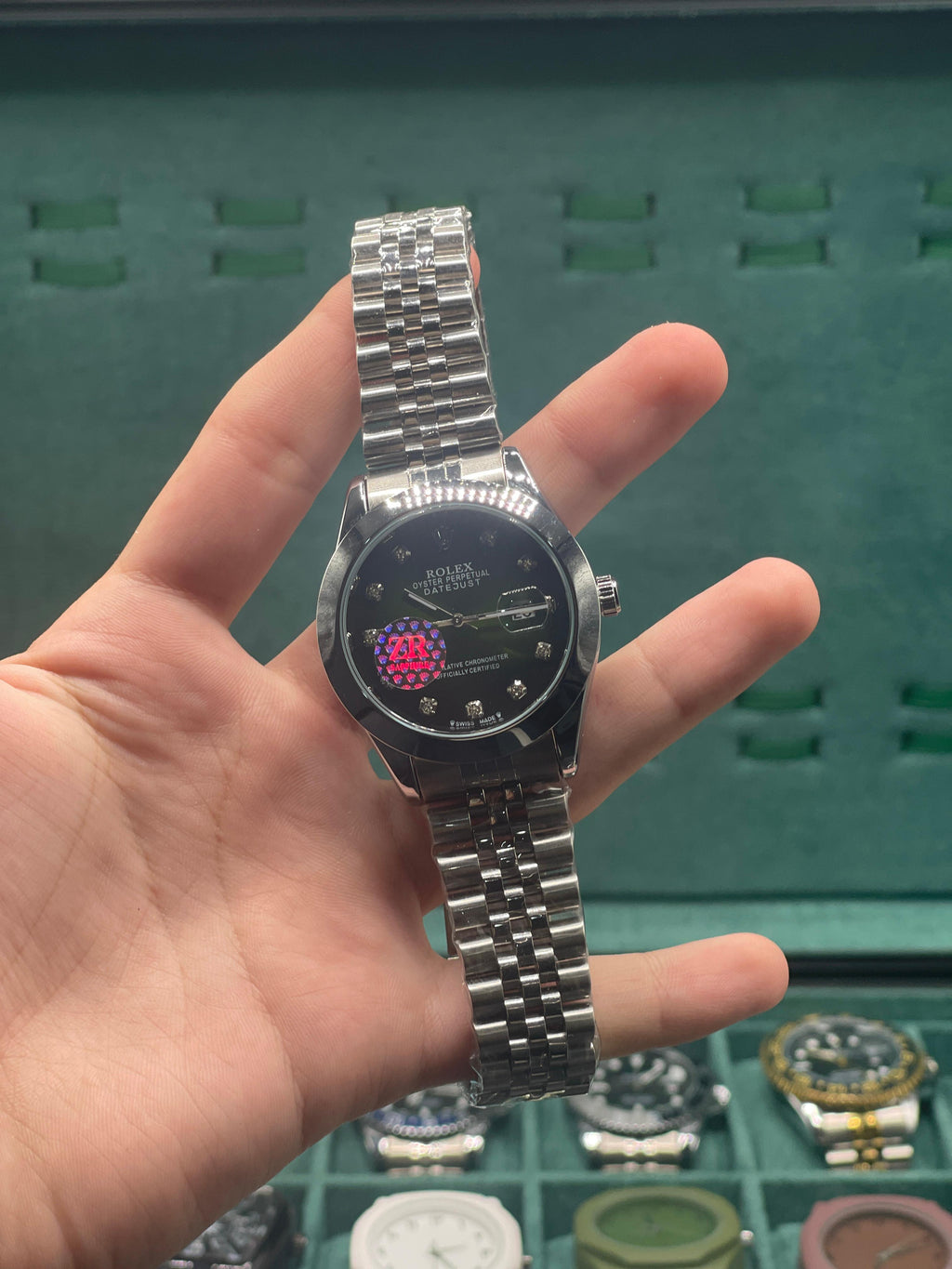 RLX Stainless Steel Dress Watch with Black Diamond Dial, Smooth Bezel, and Jubilee Bracelet
