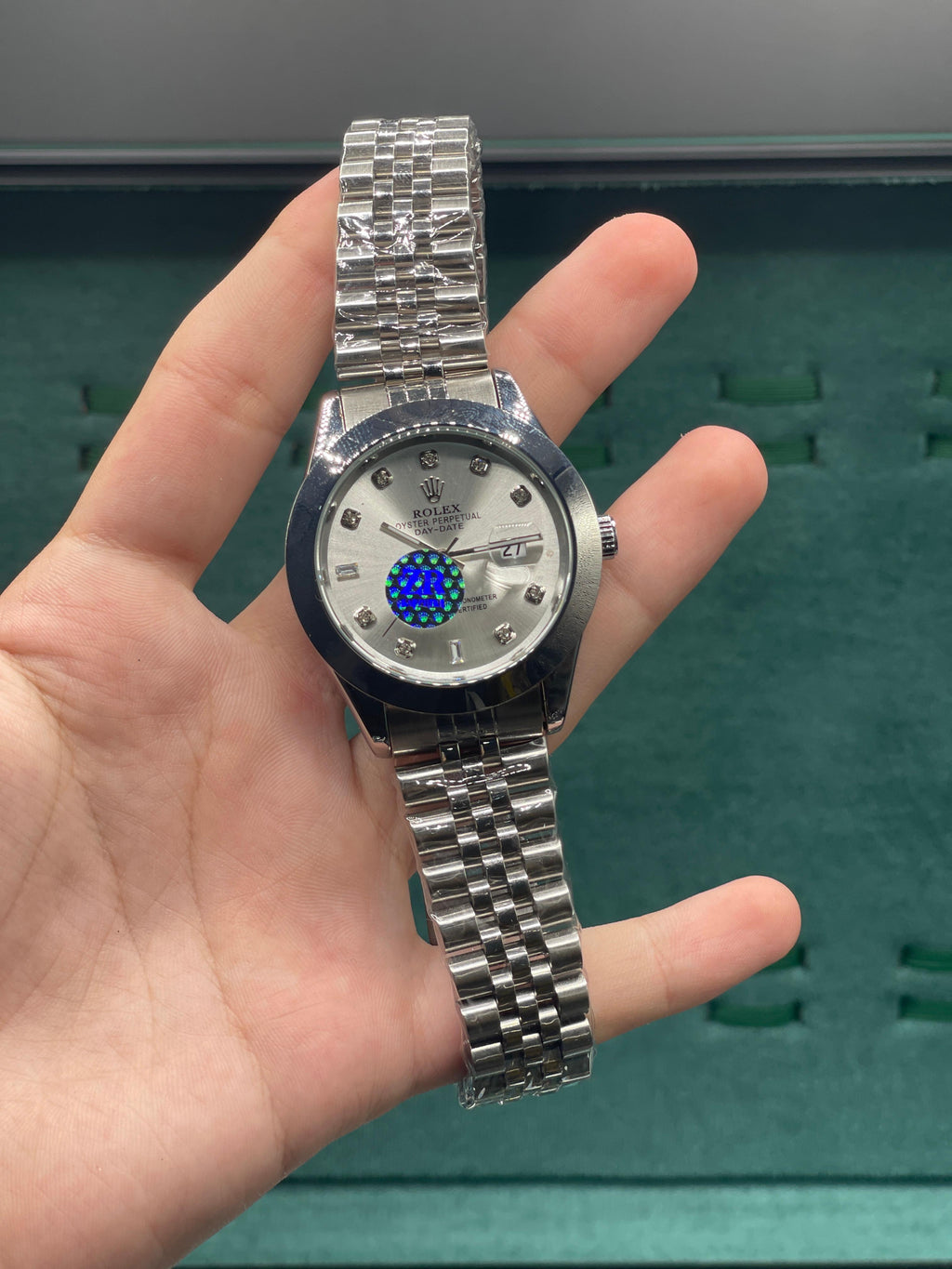 RLX Stainless Steel Dress Watch with Silver Diamond Dial, Smooth Bezel, and Jubilee Bracelet