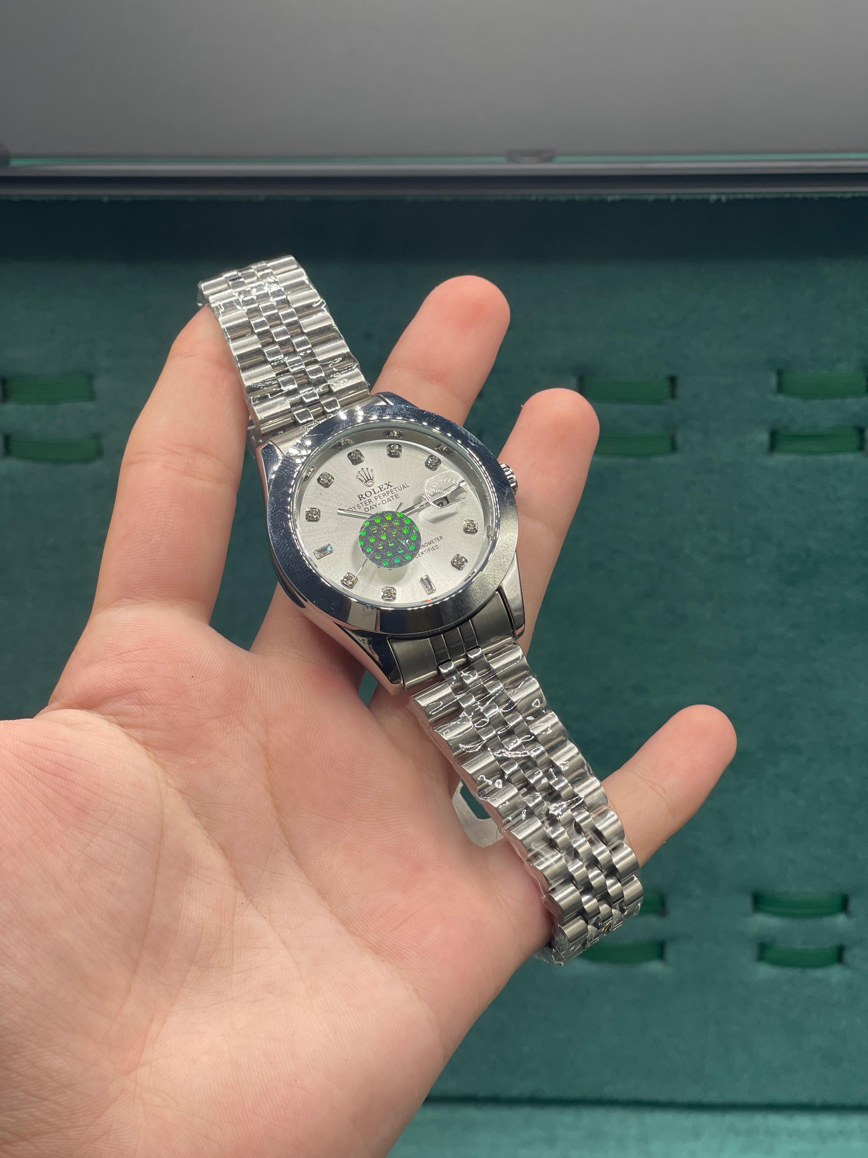 RLX Stainless Steel Dress Watch with Silver Diamond Dial, Smooth Bezel, and Jubilee Bracelet