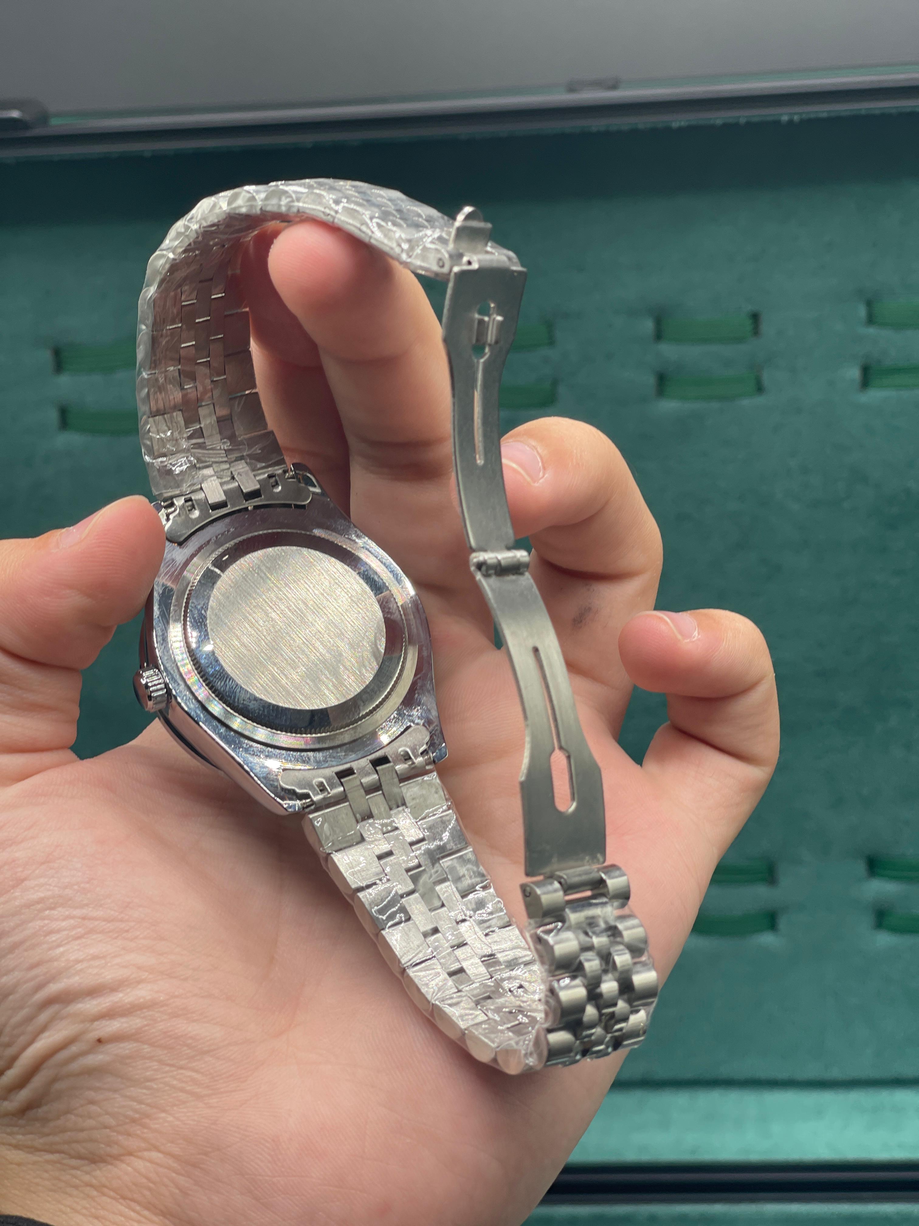 RLX Stainless Steel Dress Watch with Silver Diamond Dial, Smooth Bezel, and Jubilee Bracelet