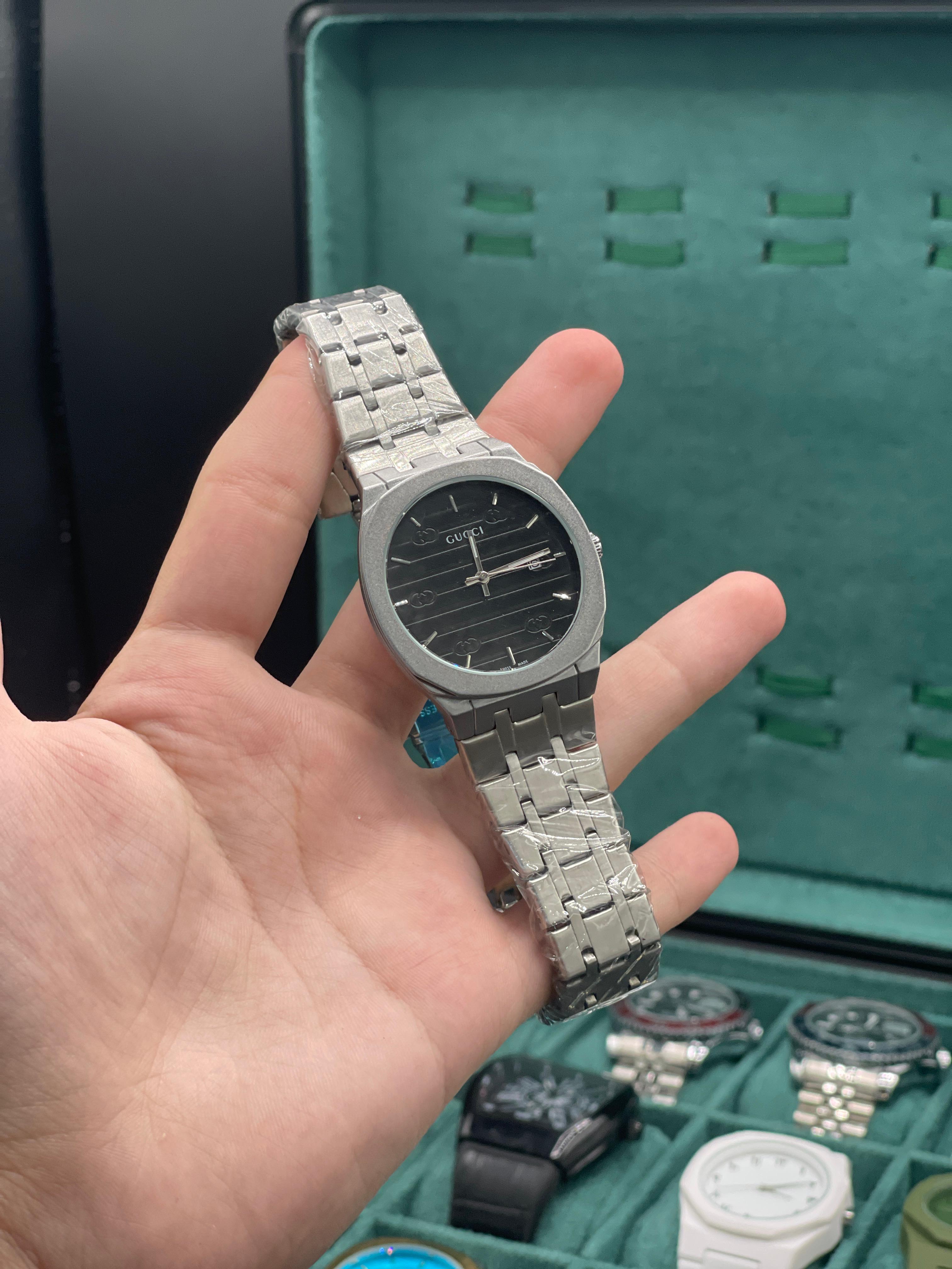 GUCI Stainless Steel Luxury Sports Watch with Black Textured Dial, Integrated Bracelet, and Octagonal Case