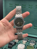 GUCI Stainless Steel Luxury Sports Watch with Black Textured Dial, Integrated Bracelet, and Octagonal Case