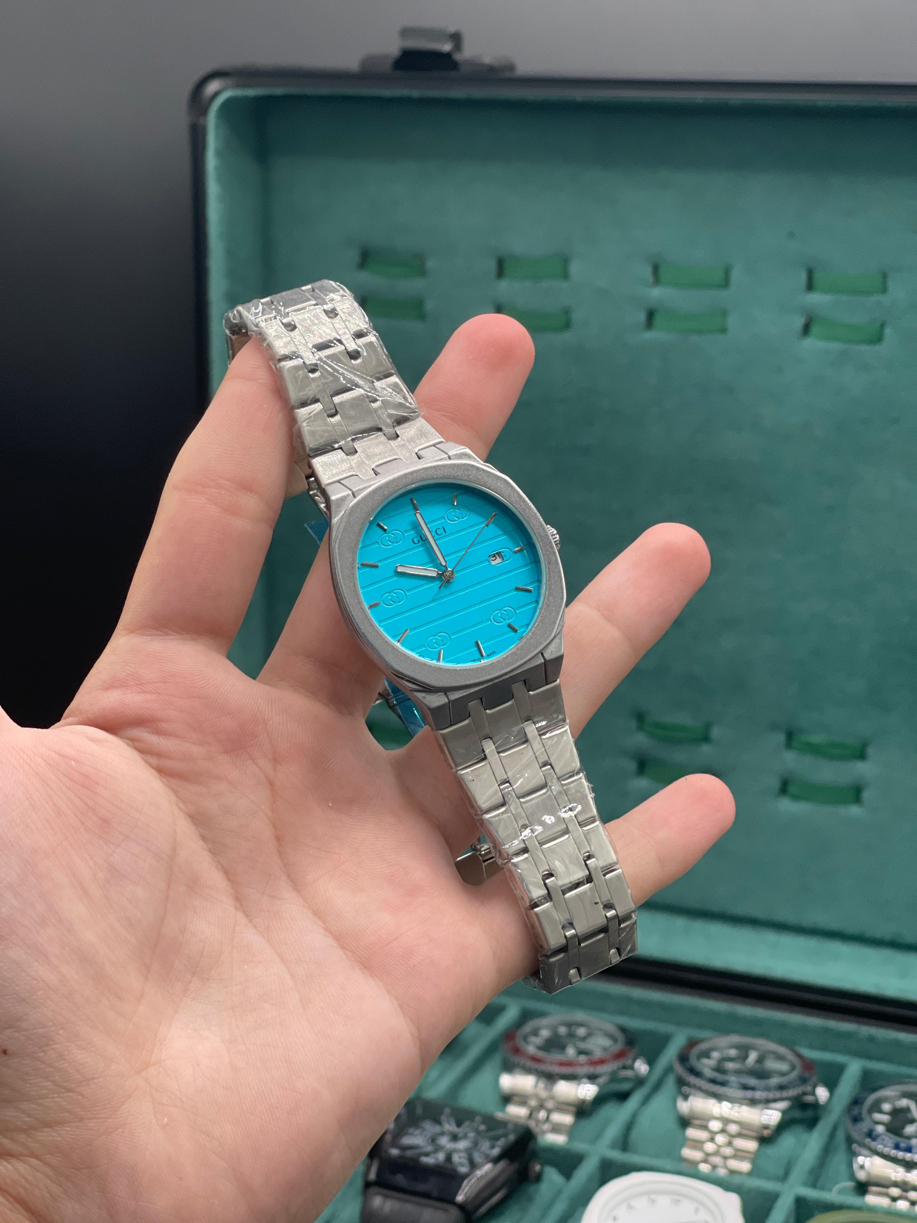 GUCI Stainless Steel Luxury Sports Watch with Turquoise Textured Dial, Integrated Bracelet, and Octagonal Case
