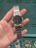 BTW Two-Tone Luxury Dress Watch with Black Textured Dial, Gold Fluted Bezel, and Integrated Bracelet