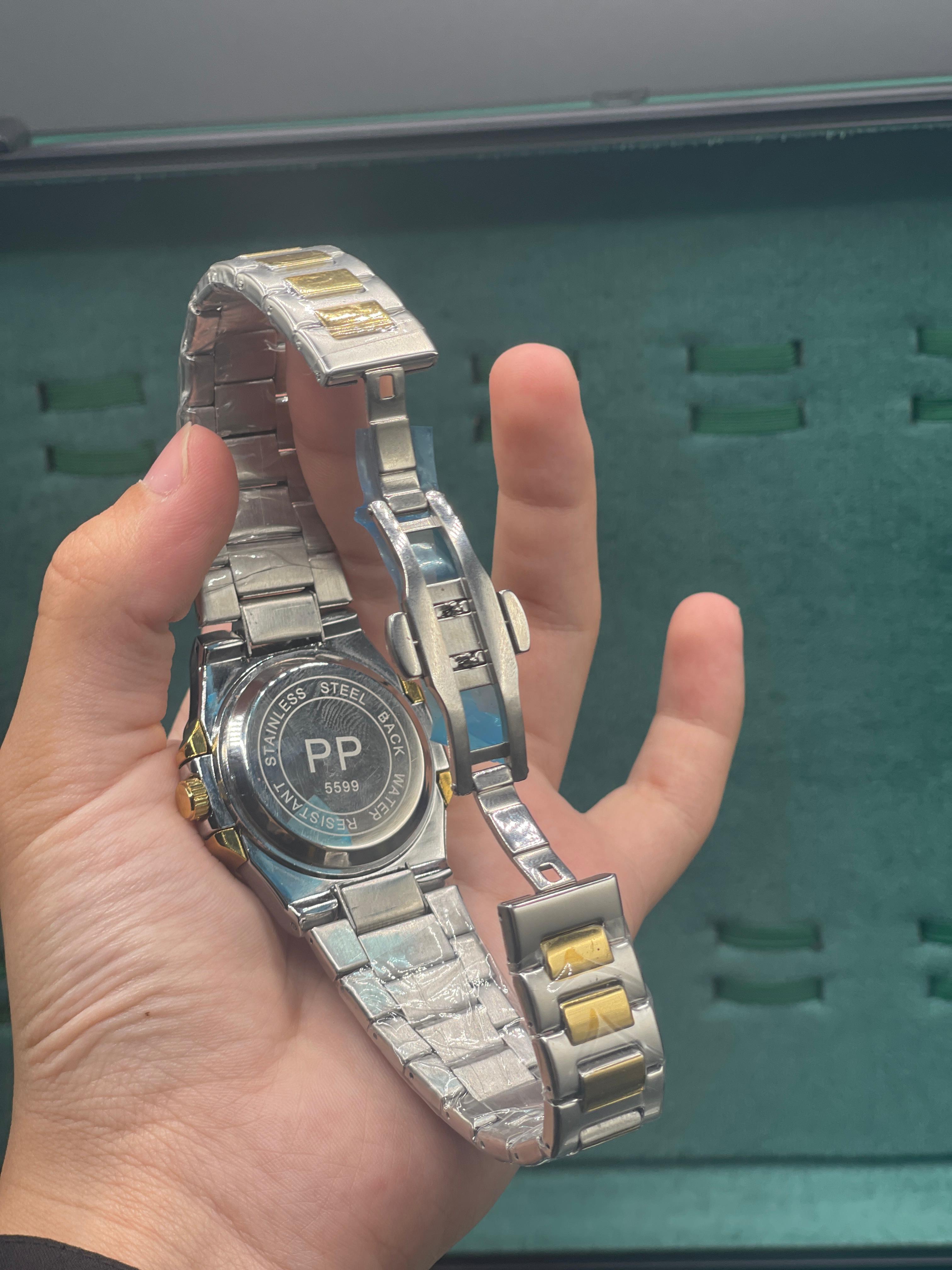 PTK Two Tone Luxury Sports Watch With Black Textured Dial With A Golden Bezel
