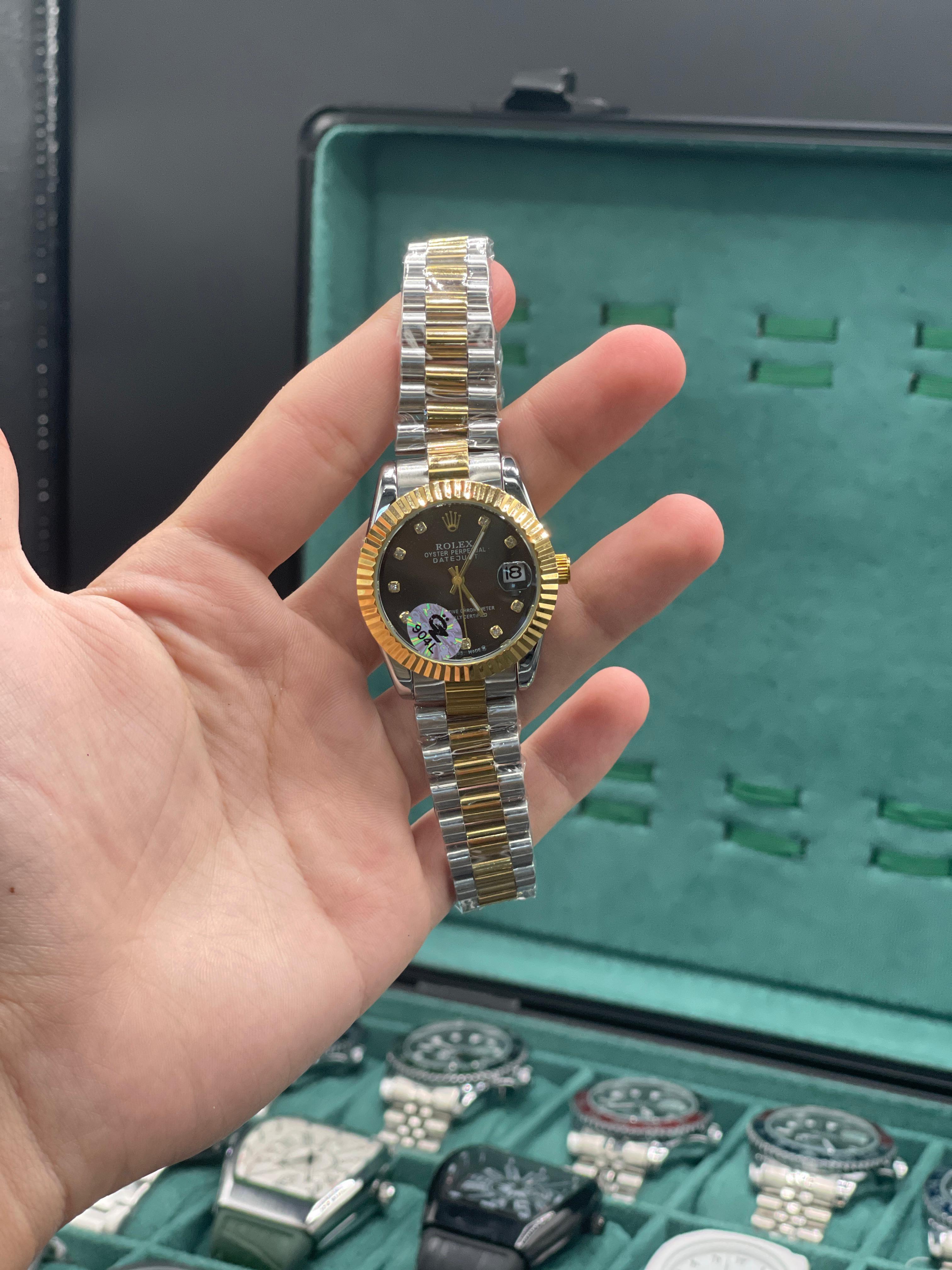RLX Two Tone Gold And Silver Chain With Sleek Black Dial Ladies Watch